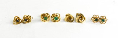 Lot 100 - Four pairs of 9ct gold earrings, of swirl...