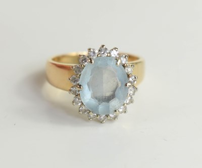 Lot 165 - A 14ct gold, aquamarine and diamond dress ring,...