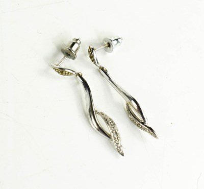 Lot 280 - A pair of 9ct white gold drop earrings, of...