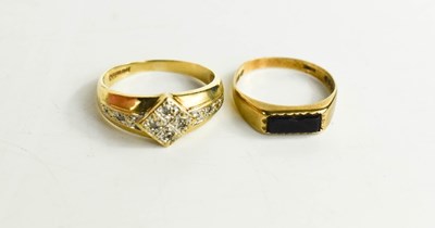 Lot 102 - A 9ct gold and diamond dress ring, the white...