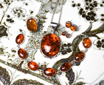Lot 28 - A set of silver and amber jewellery comprising...