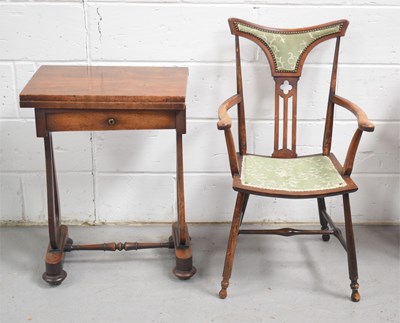 Lot 482 - A Victorian mahogany games table with swivel...