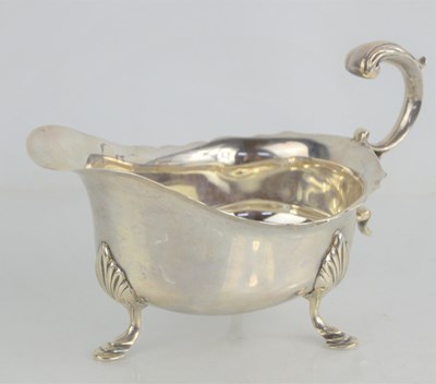 Lot 287 - An early 20th century silver sauce boat,...