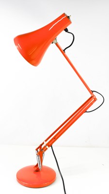 Lot 429 - A vintage Anglepoise Company lamp in orange...