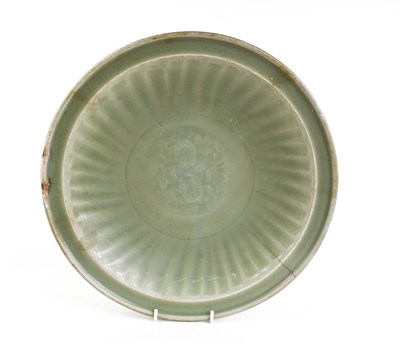 Lot 18 - A 'Longquan' celadon shallow footed bowl with...