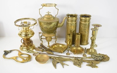 Lot 223 - A large group of brass items including trench...