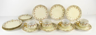 Lot 163 - A Limoges part tea service decorated with...