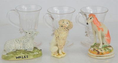 Lot 121 - A group of three small Staffordshire figures...