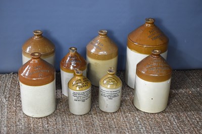 Lot 173 - A collection of eight various stoneware beer...