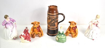 Lot 79 - A group of Royal Doulton figures, together...