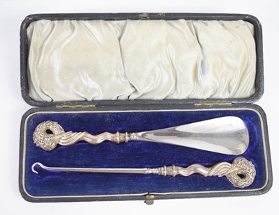 Lot 272 - A Victorian silver handled shoe horn and...