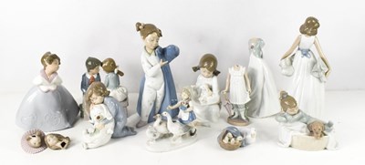 Lot 186 - A group of ten Nao figurines, including a...