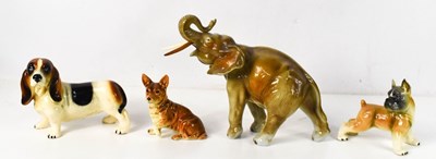 Lot 120 - A group of ceramic animals comprising a...