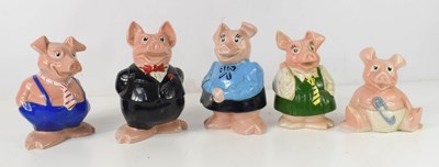 Lot 119 - A group of five Wade Nat West Piggy banks, a...