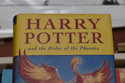 Lot 325 - A collection of J K Rowling books, comprising...