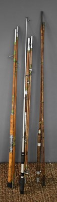 Lot 352 - A group of vintage fishing rods.