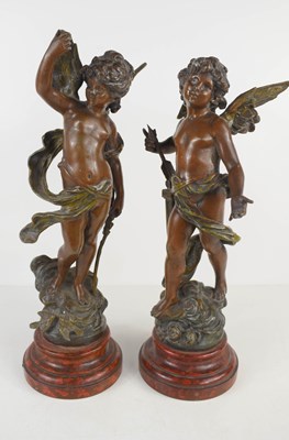 Lot 287 - A pair of bronzed and patinated metal figures...