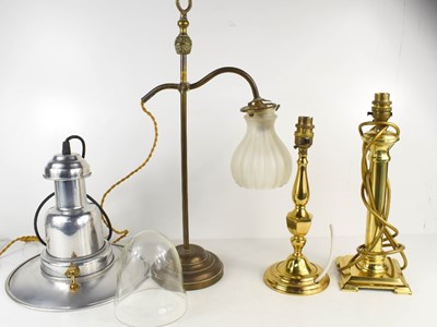 Lot 438 - A vintage rise and fall brass stick lamp with...