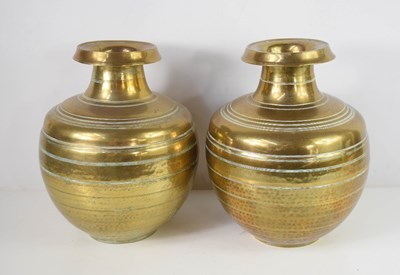 Lot 417 - A pair of large brass vases, of turned ovoid...