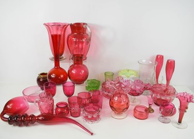 Lot 78 - A large group of cranberry glass including a...