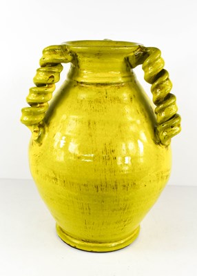 Lot 70 - A lime green glazed earthenware studio pottery...