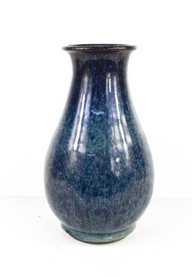 Lot 73 - A blue flambe glazed vase of baluster form,...