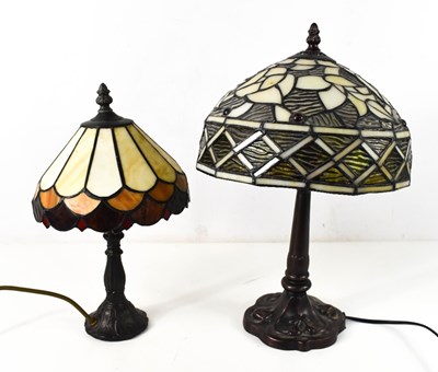 Lot 435 - Two Tiffany style table lamps, the larger with...