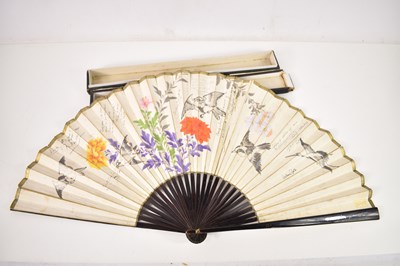 Lot 375 - A 19th century paper leaf fan, hand painted...