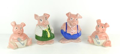 Lot 183 - A group of four Wade Nat West piggy banks with...