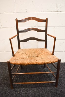 Lot 474 - A 19th century elm regional chair, with shaped...