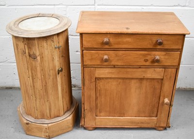 Lot 468 - An antique pine cylindrical cabinet, with...