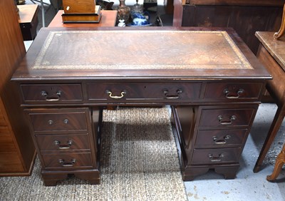 Lot 470 - A 20th century mahogany twin pedestal desk,...