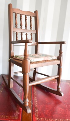 Lot 448 - A 19th century style child's rocking chair...