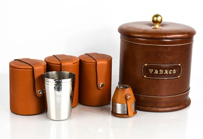 Lot 387 - A leather clad tobacco jar, and four sets of...