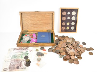 Lot 312 - A collection of GB banknotes and coins to...