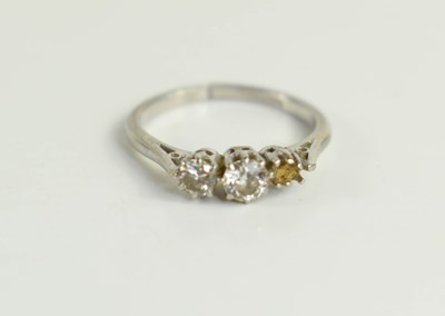 Lot 169 - A platinum and diamond three stone ring, the...