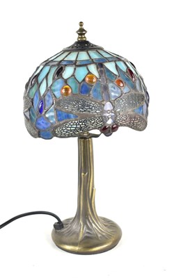 Lot 225 - A Tiffany style table lamp with dragonfly...