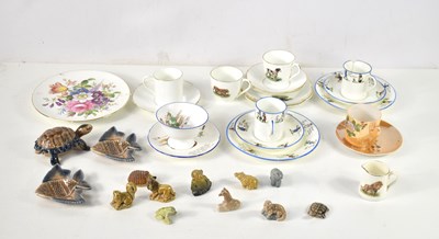 Lot 121 - A collection of Wade Whimsies, fish dishes and...