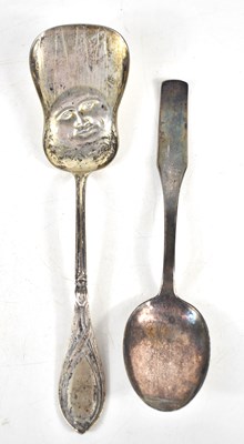 Lot 355 - A Eugen Marcus 800 grade silver serving spoon,...