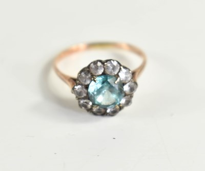 Lot 65 - A 9ct gold and paste cluster ring set with an...