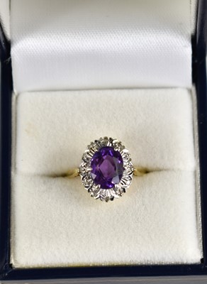 Lot 158 - An 18ct gold, amethyst and diamond set ring,...