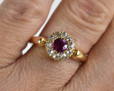 Lot 198 - A gold, ruby or pink sapphire and diamond ring,...