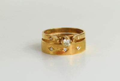 Lot 199 - An 18ct gold and diamond engagement ring and...