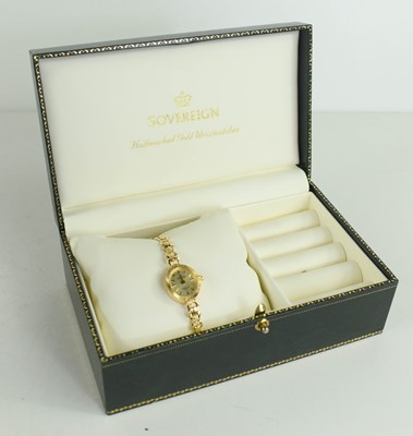 Lot 256 - A 9ct gold Sovereign cocktail watch the signed...