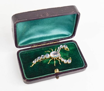 Lot 2 - A gold and moonstone brooch in the form of a...