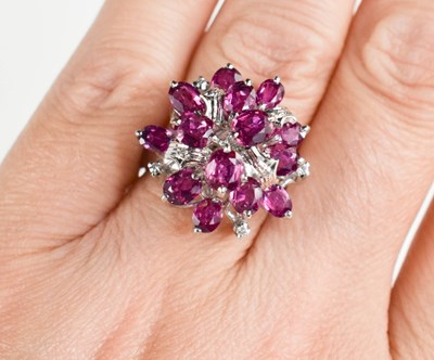 Lot 4 - An 18ct white gold, pink sapphire and diamond...