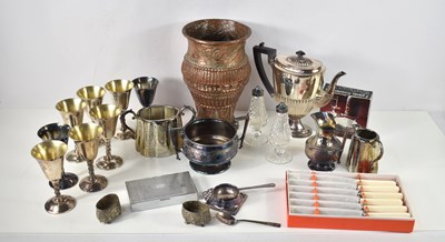 Lot 227 - A group of metal ware to include an Arts and...