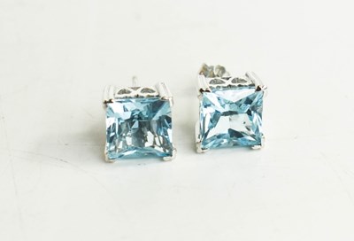 Lot 8 - A pair of white 9ct gold earrings set with...