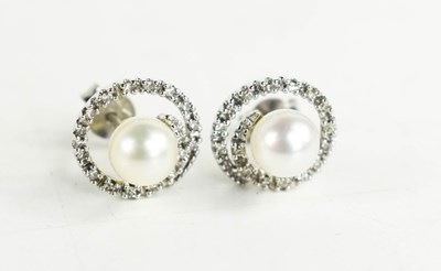 Lot 9 - A pair of white 9ct gold pearl and diamond set...