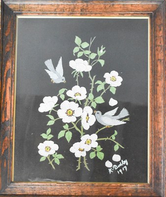 Lot 264 - An embroidered picture of birds amongst cherry...